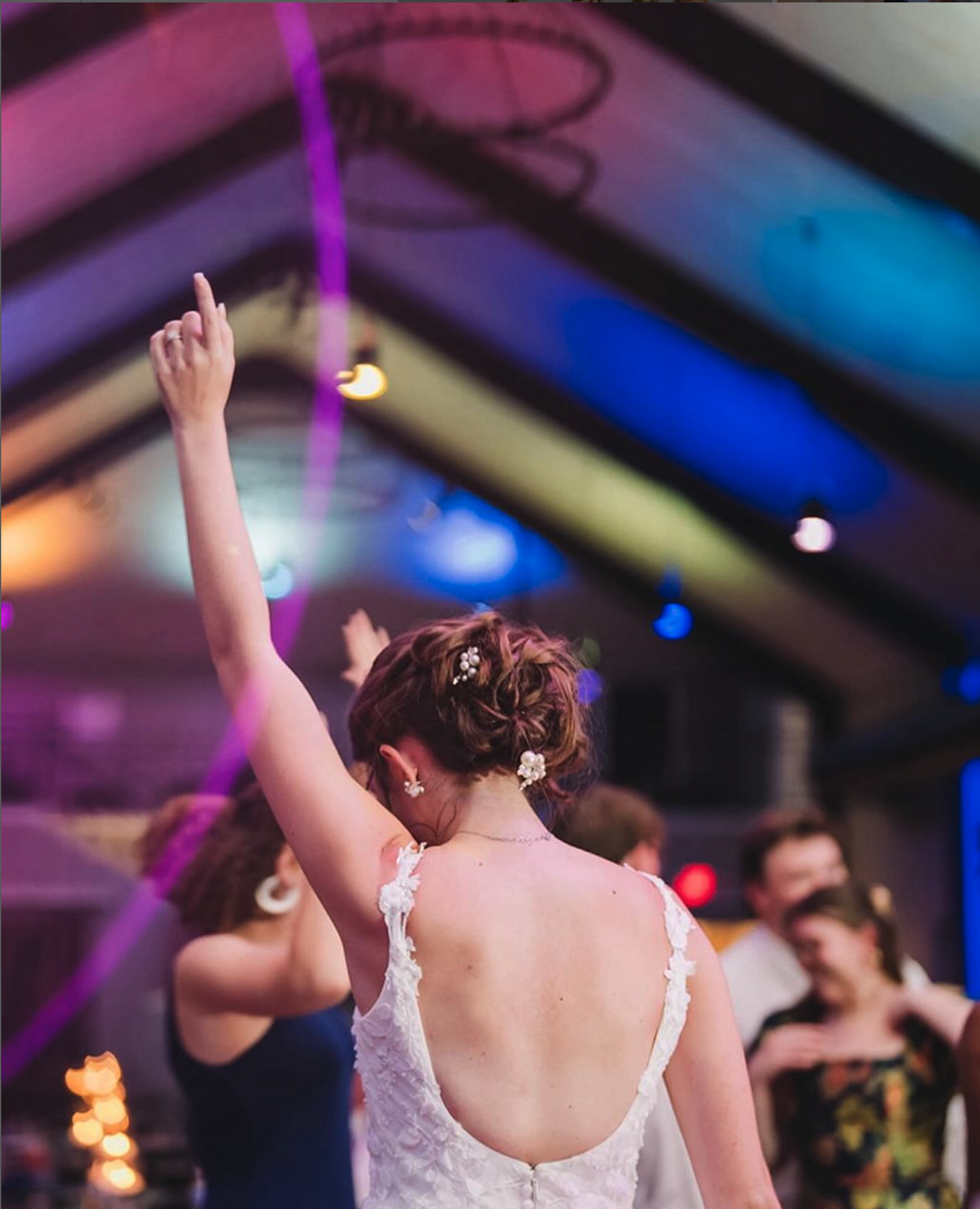 bride enjoys dancing at her wedding with icon djs playing music
